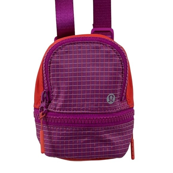 lululemon athletica Handbags - Lululemon Purple and Red/Orange Mini Crossbody Bag With Adjustable Strap